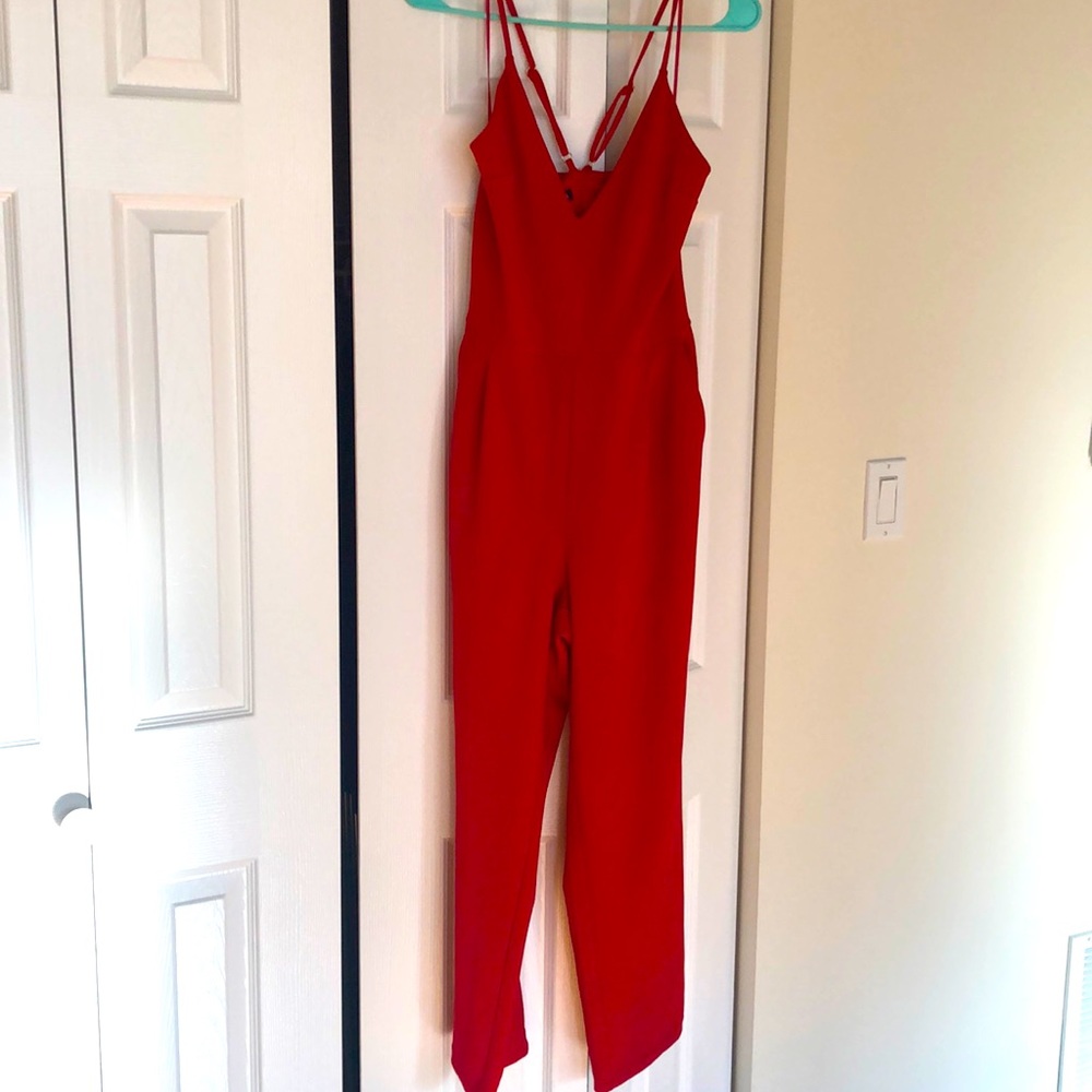 Red Express jumpsuit with pockets